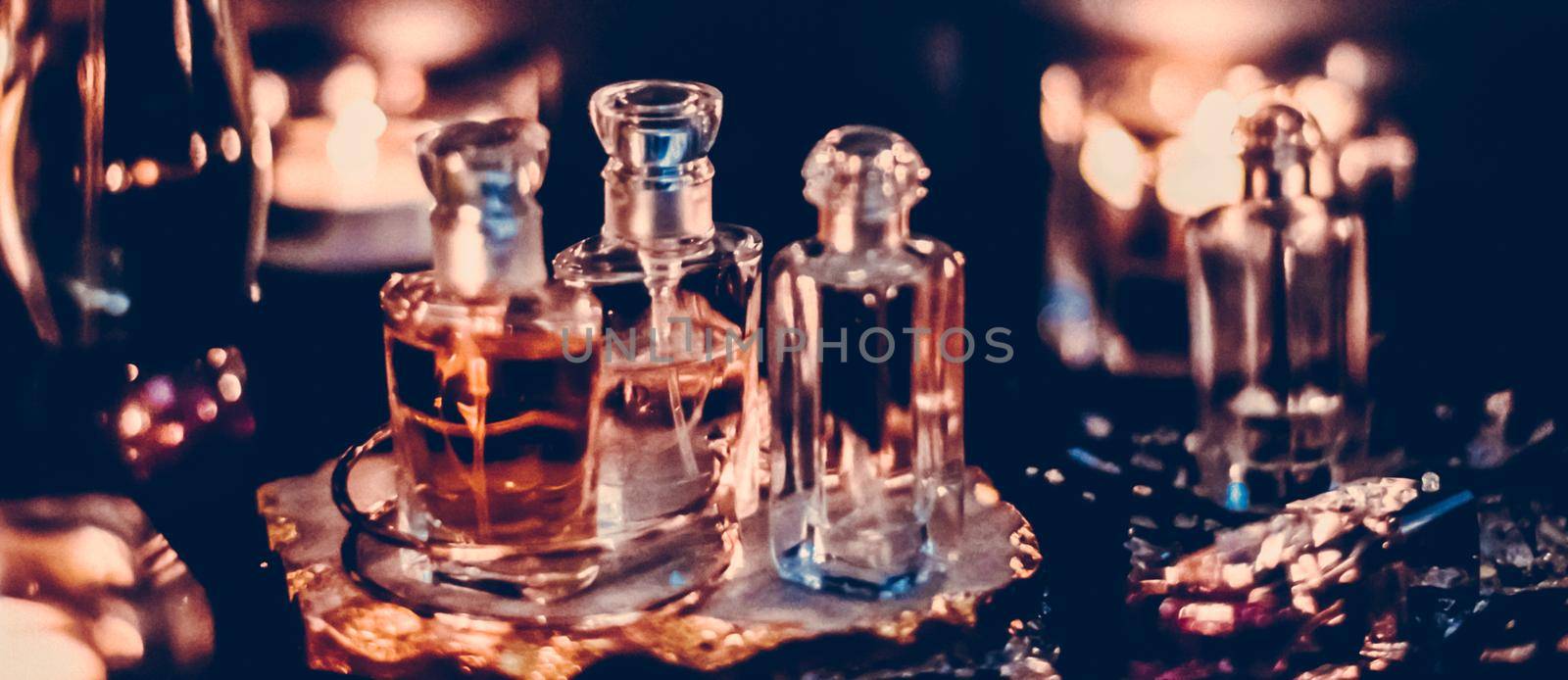 Perfume bottles and vintage fragrance at night, aroma scent, fragrant cosmetics and eau de toilette as luxury beauty brand, holiday fashion parfum design by Anneleven