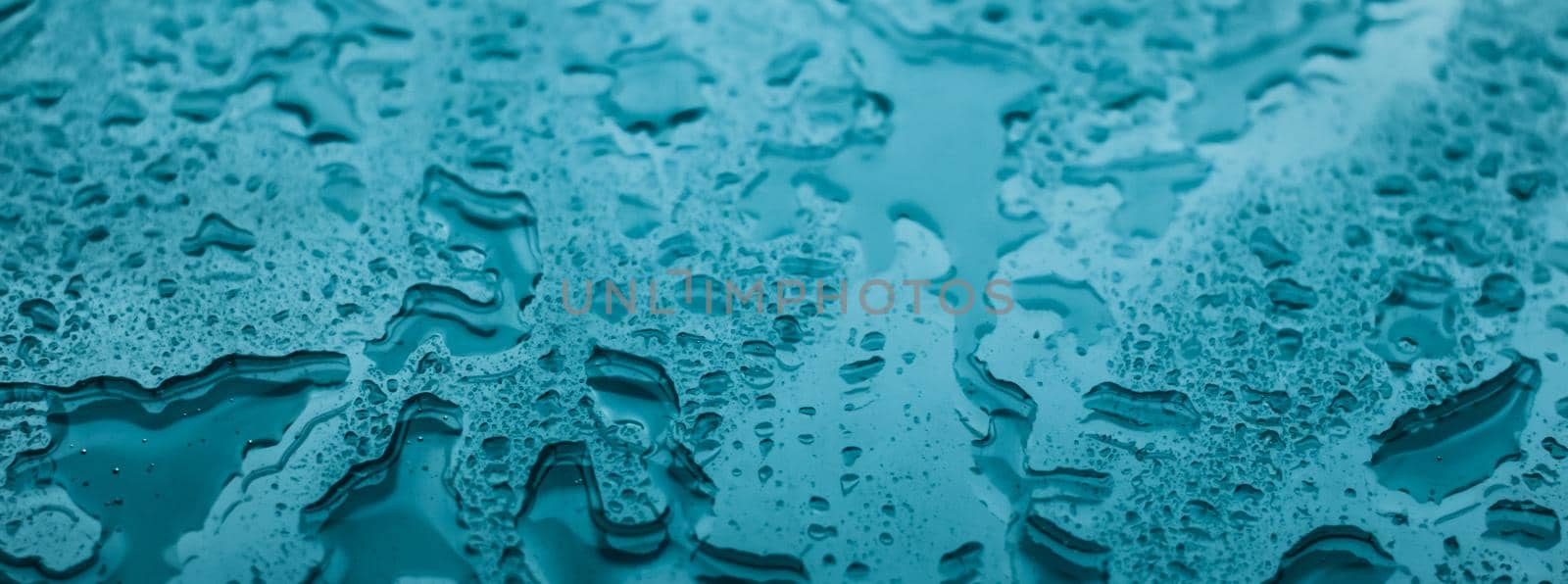 Liquid, wet and zen concept - Water texture abstract background, aqua drops on turquoise glass as science macro element, rainy weather and nature surface art backdrop for environmental brand design