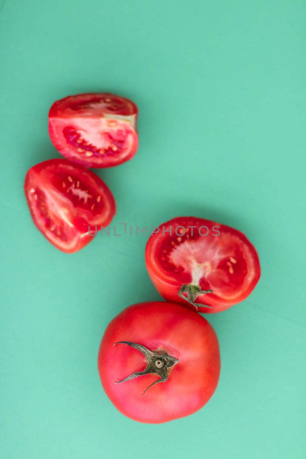 Plant based diet, vegetarian recipe and farm garden concept - Fresh ripe red tomatoes on green background, organic vegetable food