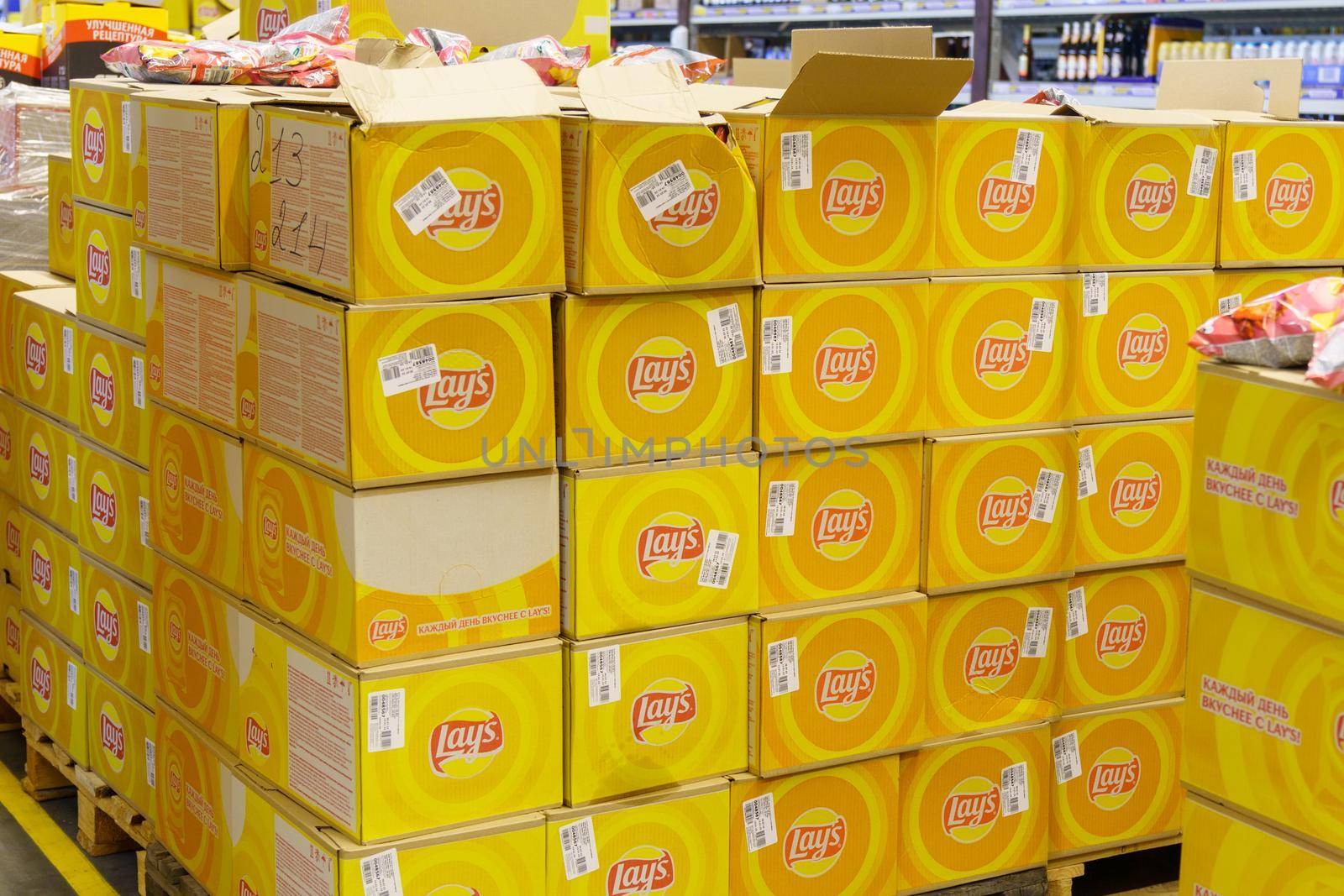Tyumen, Russia-September 27, 2022: Lays a popular brand of potato chips on display at an sale in a supermarket.