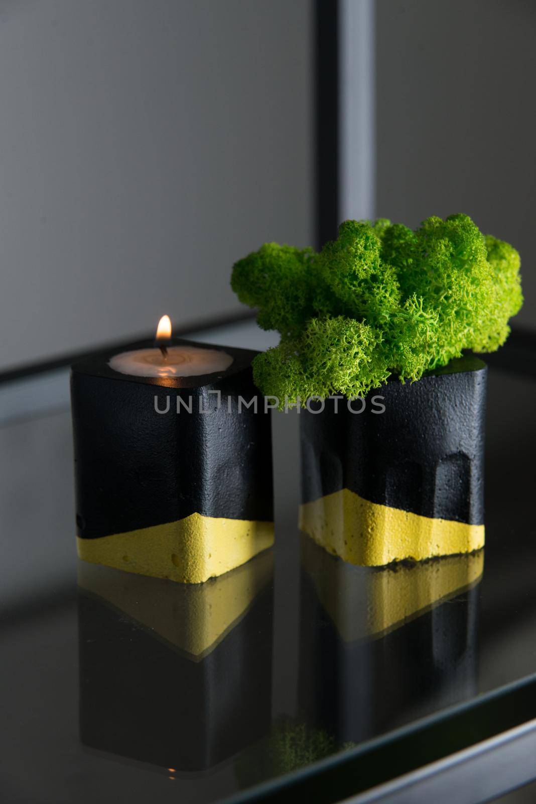 candle and moss in black and yellow concrete candle holders by Ashtray25