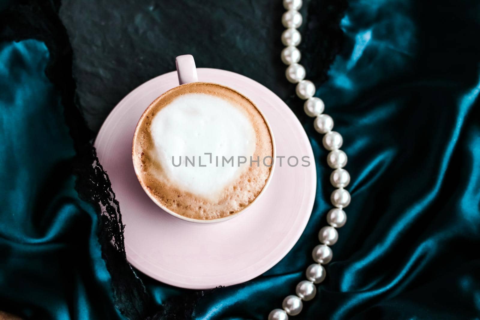 Menu, branding and recipe concept - Cup of cappuccino for breakfast with satin and pearls jewellery background, organic coffee with lactose free milk in parisian cafe for luxury vintage holiday brand