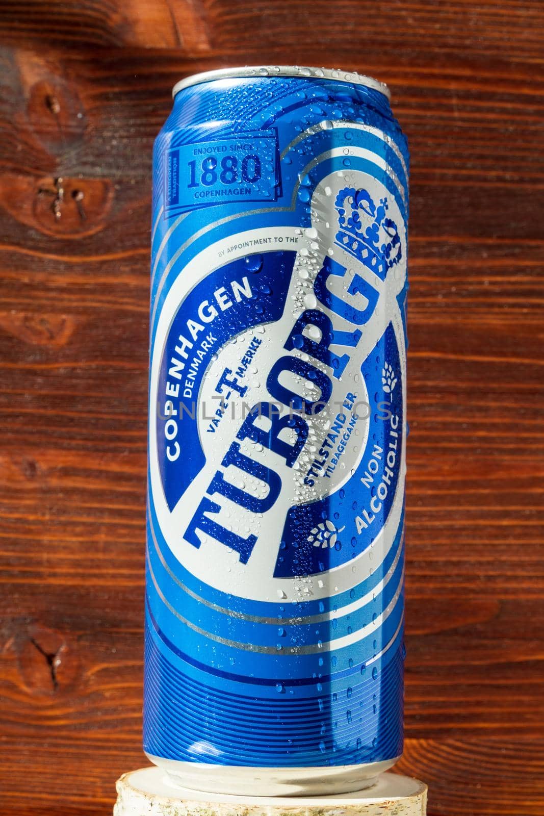 Tyumen, Russia-August 02, 2022: Tuborg, a Danish brewing company founded in 1873 in Hellerup, a can of non-alcoholic beer. Vertical photo
