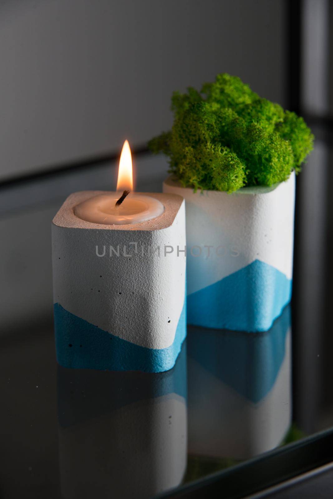 candle and moss in white and blue concrete candle holders by Ashtray25