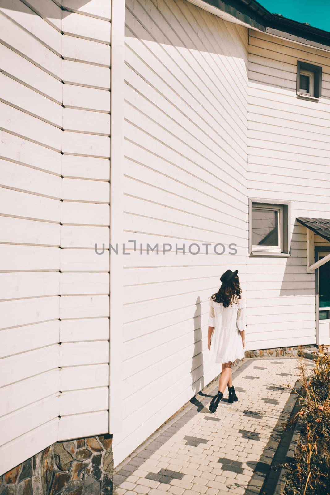 lifestyle fashion portrait of young stylish hipster woman walking on the street. by Ashtray25
