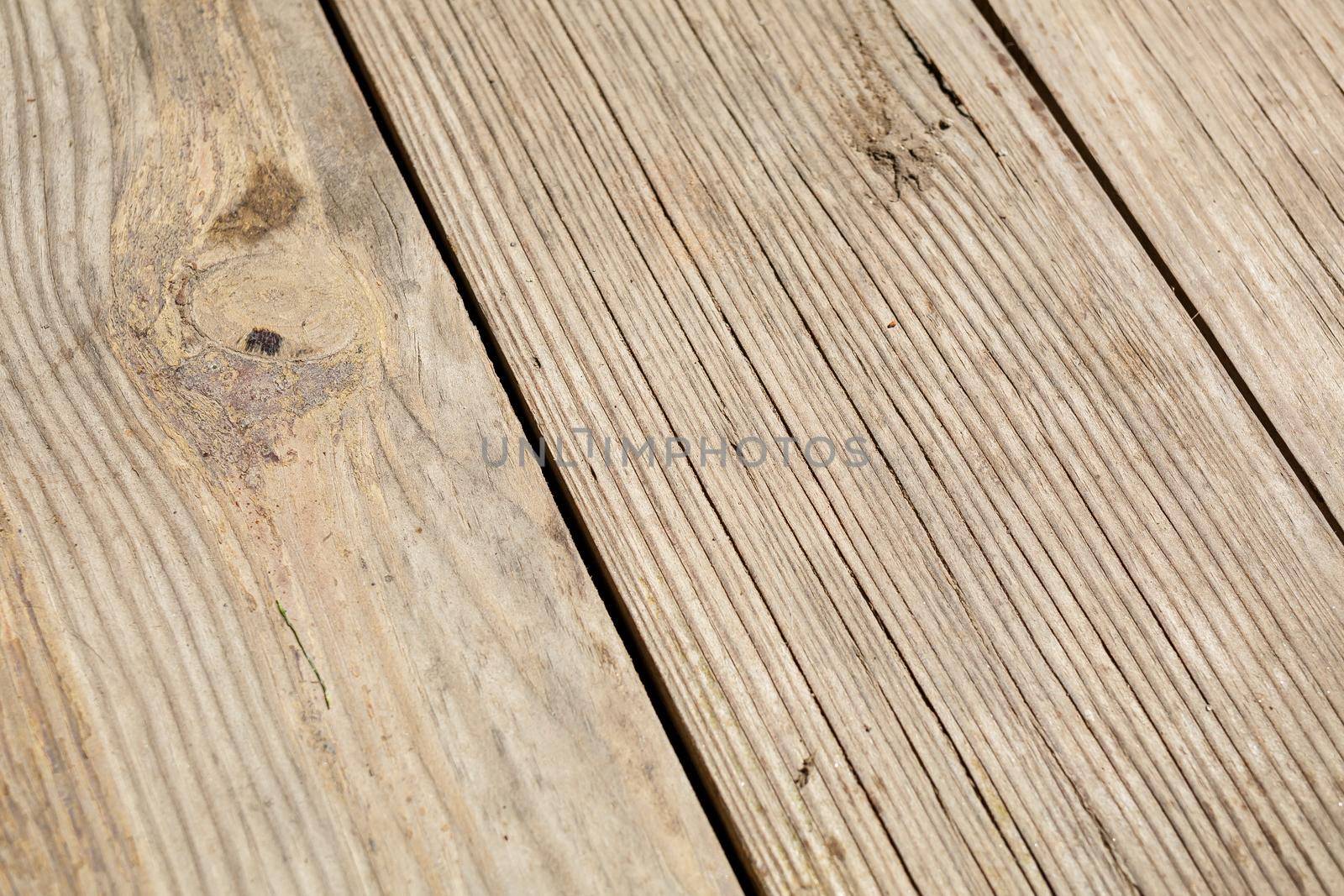 Wood natural flooring. Wood texture. Sanded wooden boards