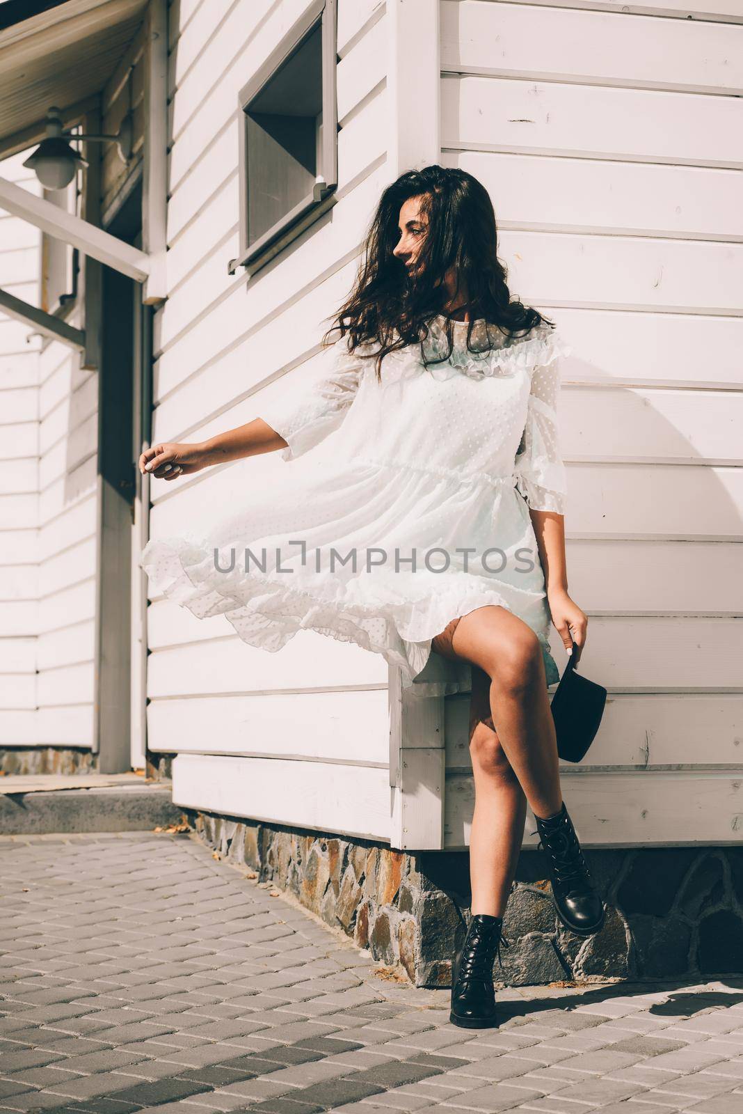 lifestyle fashion portrait of young stylish hipster woman walking on the street. by Ashtray25