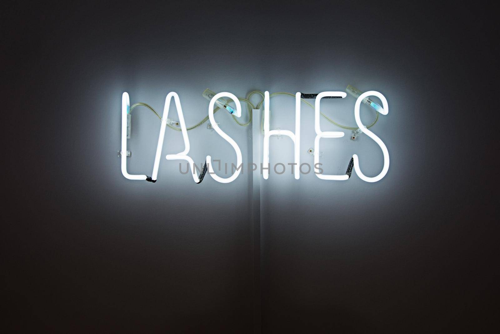 Shining Lashes white Neon Label. advertising for a beauty salon