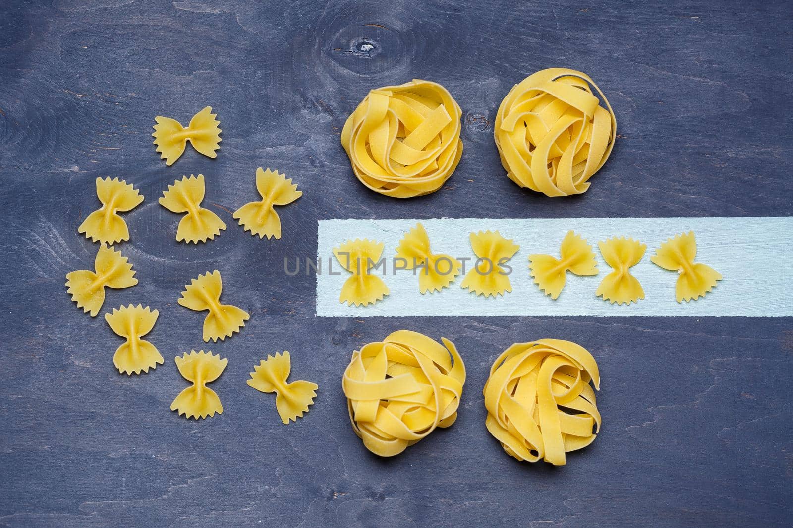 Pasta with durum wheat. Food for vegans. Proper nutrition, healthy food. Gray background