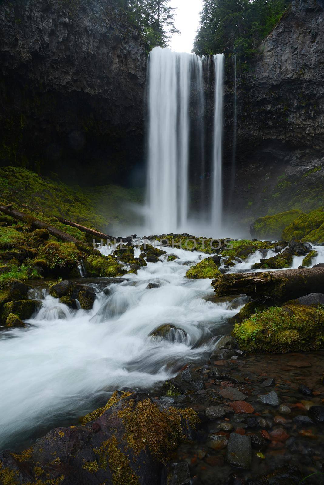 Tamanawas waterfall with mist in oregon