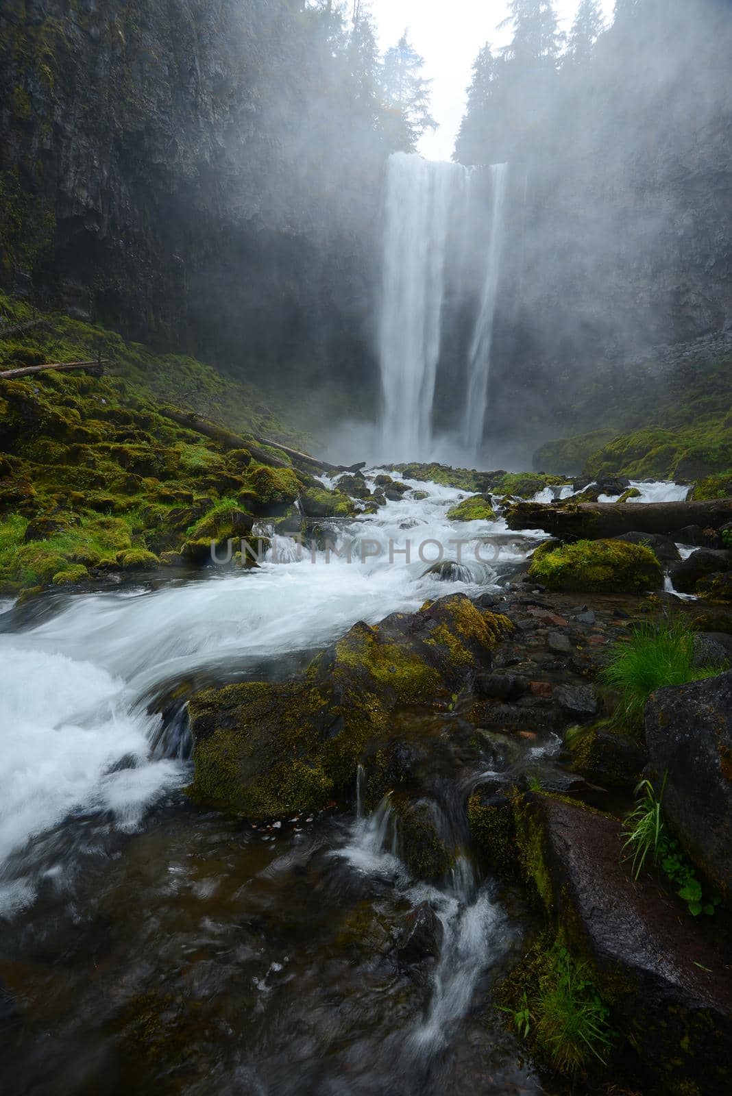 Tamanawas waterfall with mist in oregon