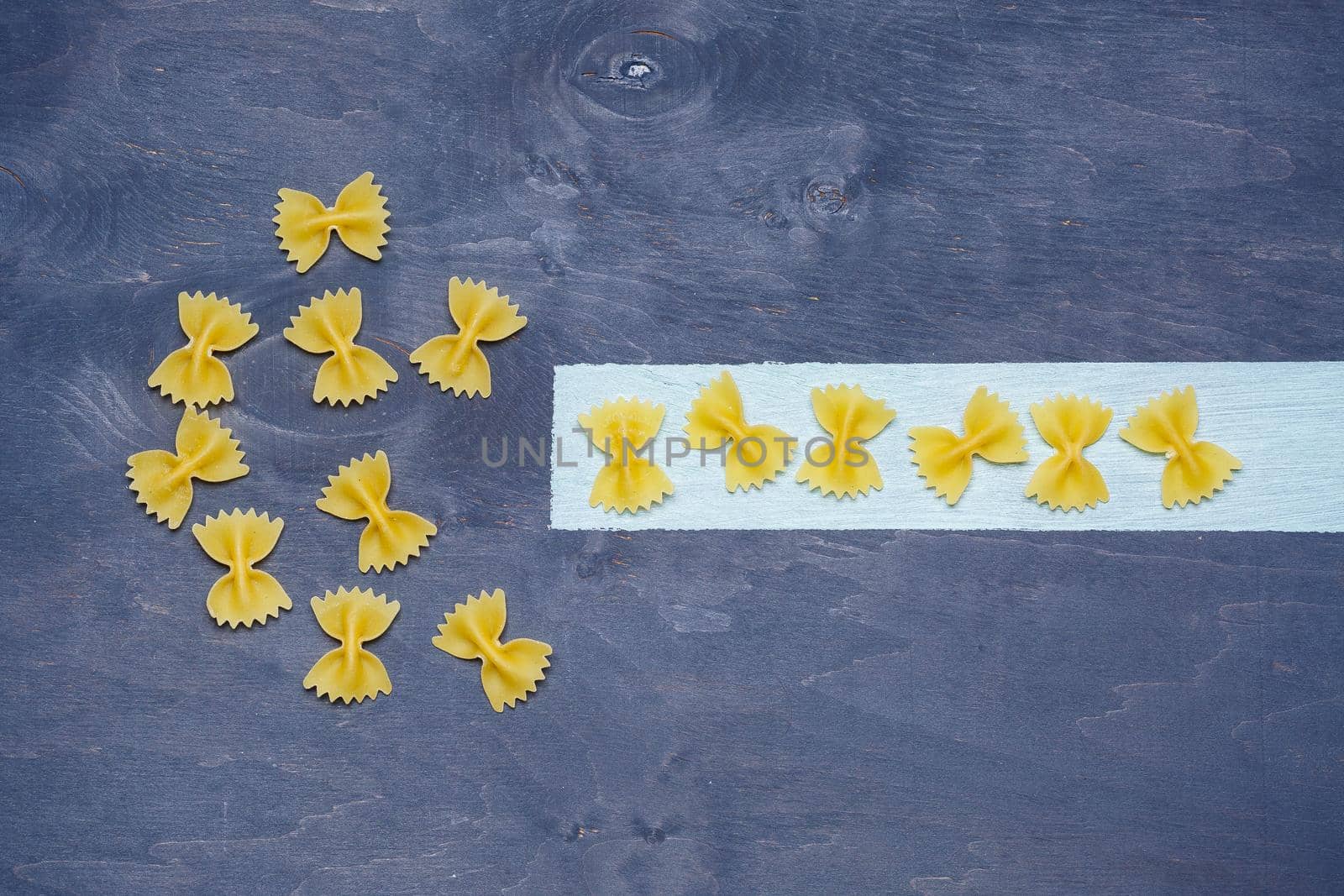 Pasta with durum wheat. Food for vegans. Proper nutrition, healthy food. Gray background