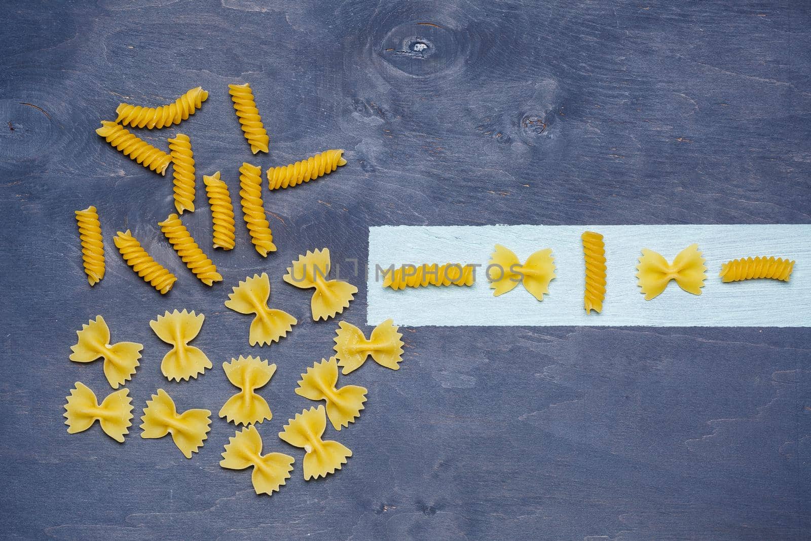 Pasta with durum wheat. Food for vegans. Proper nutrition, healthy food. Gray background