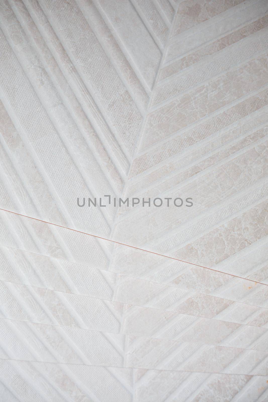 Pile of ceramic tiles in the bathroom, indoor walls. Conceptual repair in apartments, tile laying, repair inside