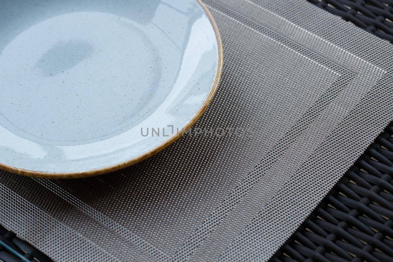 Empty plate of blue glaze ceramic melamine for dinner.