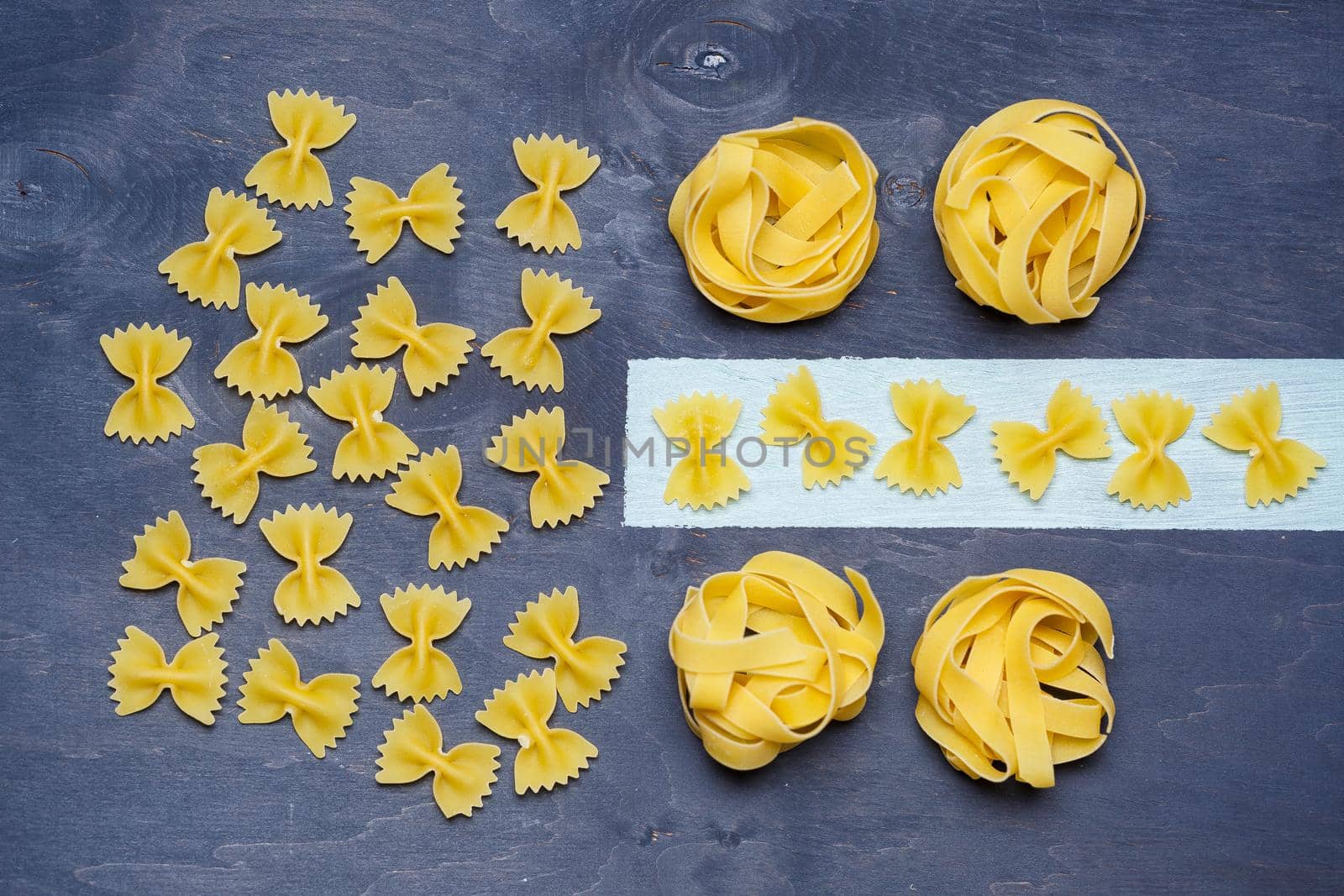 Pasta with durum wheat. Food for vegans. Proper nutrition, healthy food. Gray background