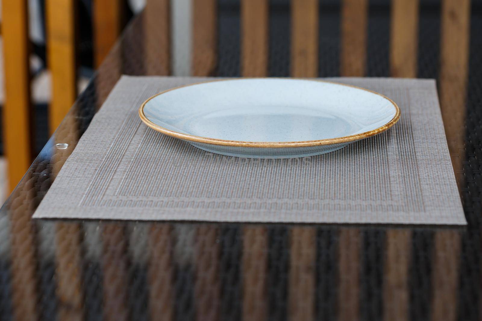 Empty plate of blue glaze ceramic melamine for dinner.
