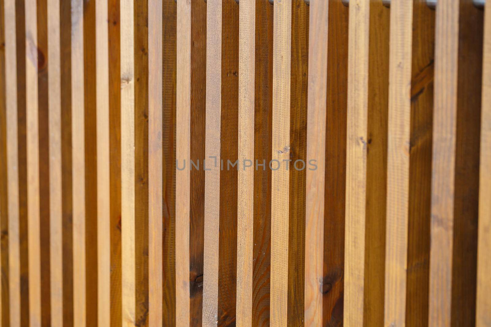 Wall made of wooden slats, natural materials for renovation