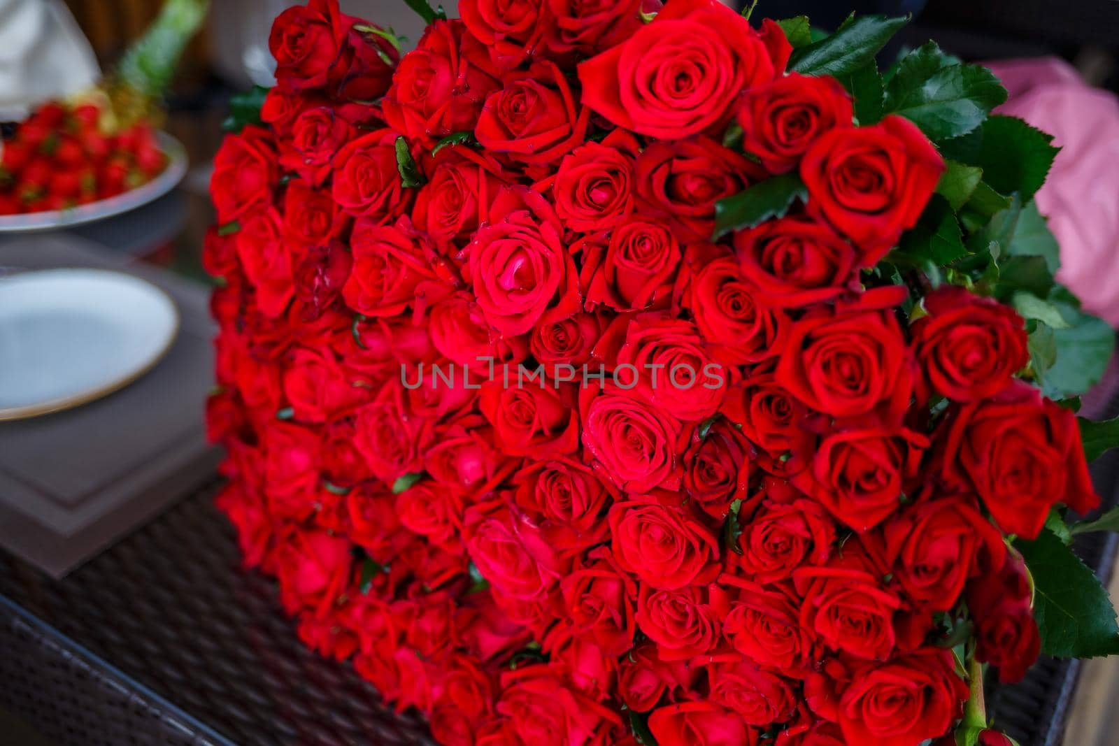 A large bouquet of red roses for a girl, fresh flowers by Dmitrytph