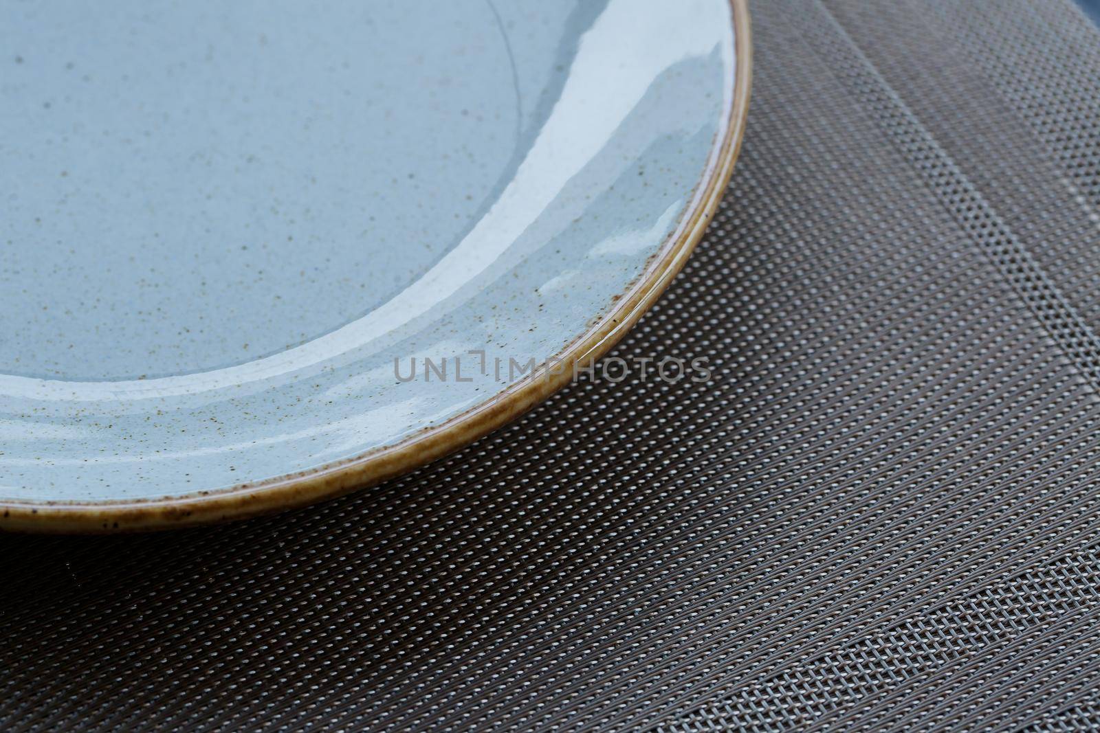 Empty plate of blue glaze ceramic melamine for dinner.