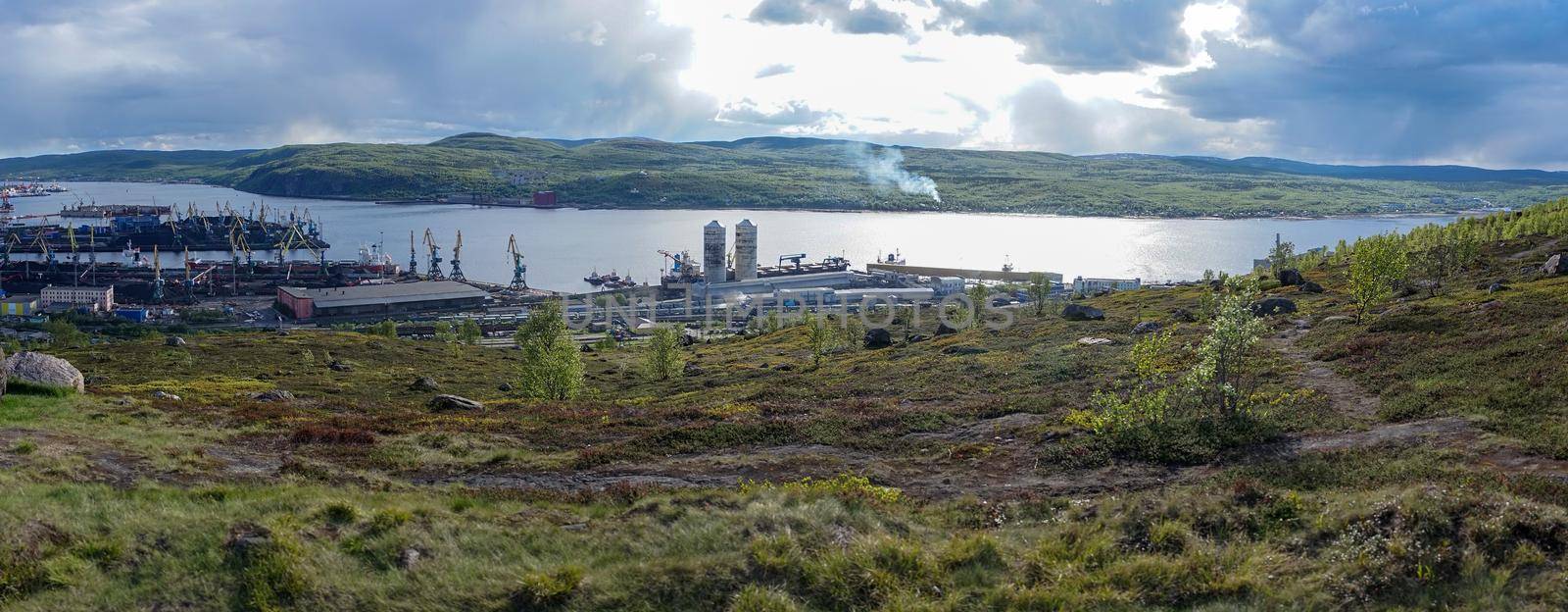 Murmansk, Russia. Industrial landscape on the shore of the Kola Bay.