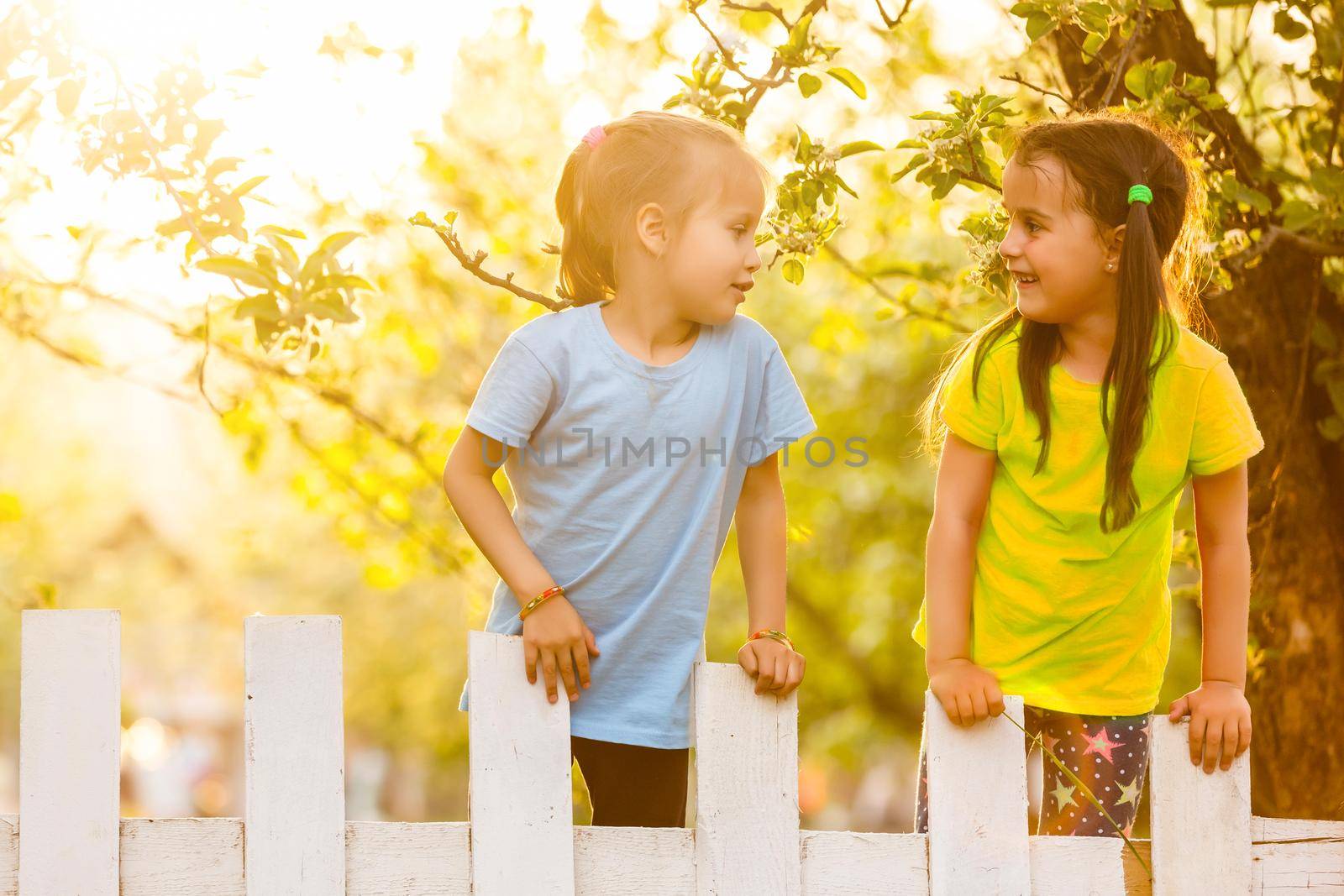 Two Little Girls Having Fun in the Park