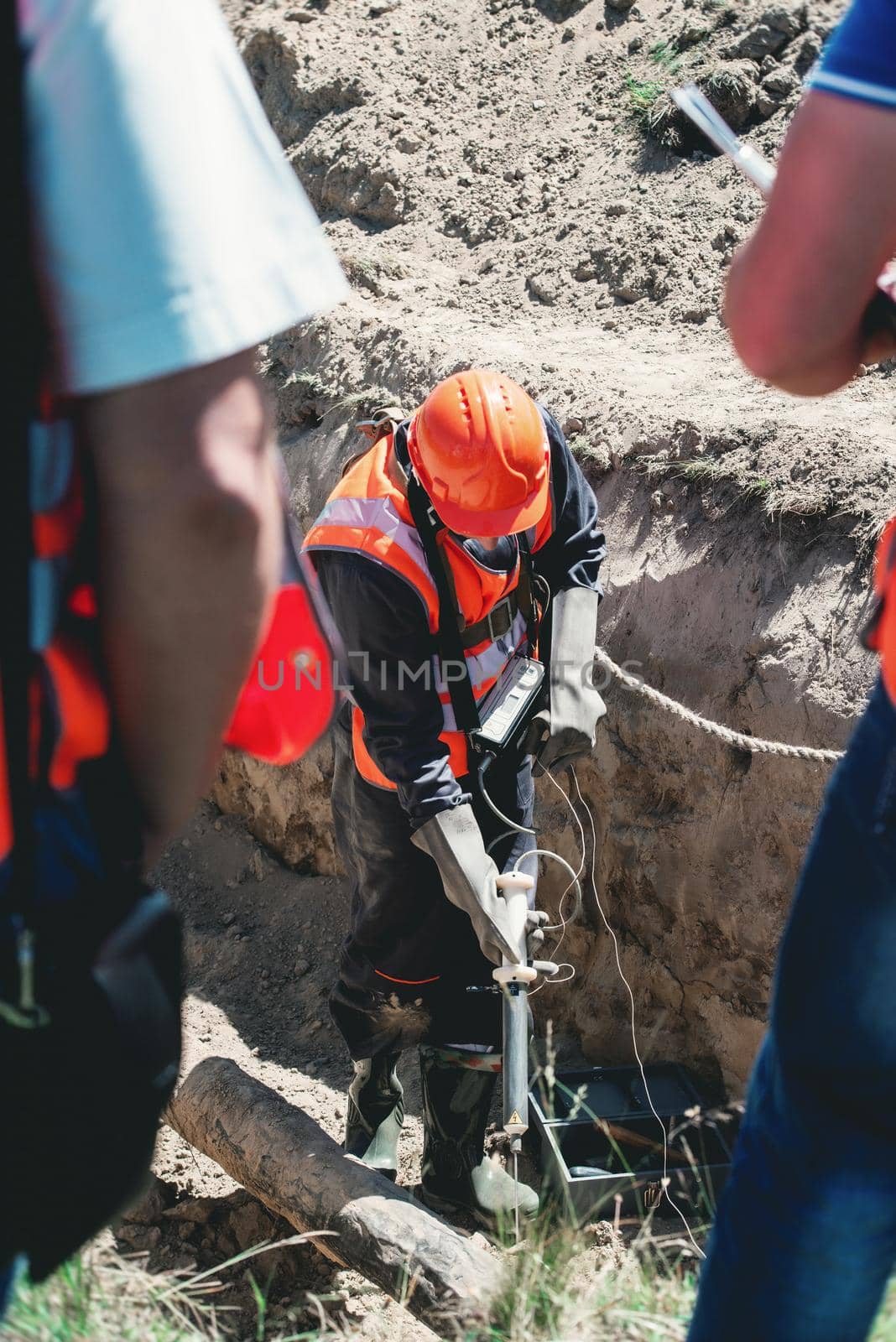 Mechanical engineer checking and inspect gas concentration in a place of possible outflow. maintenance services.