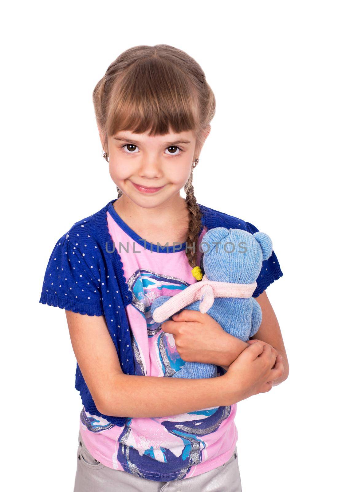 Little girl holding a teddy bear. Isolated on white background. Girl hugging two teddybears.