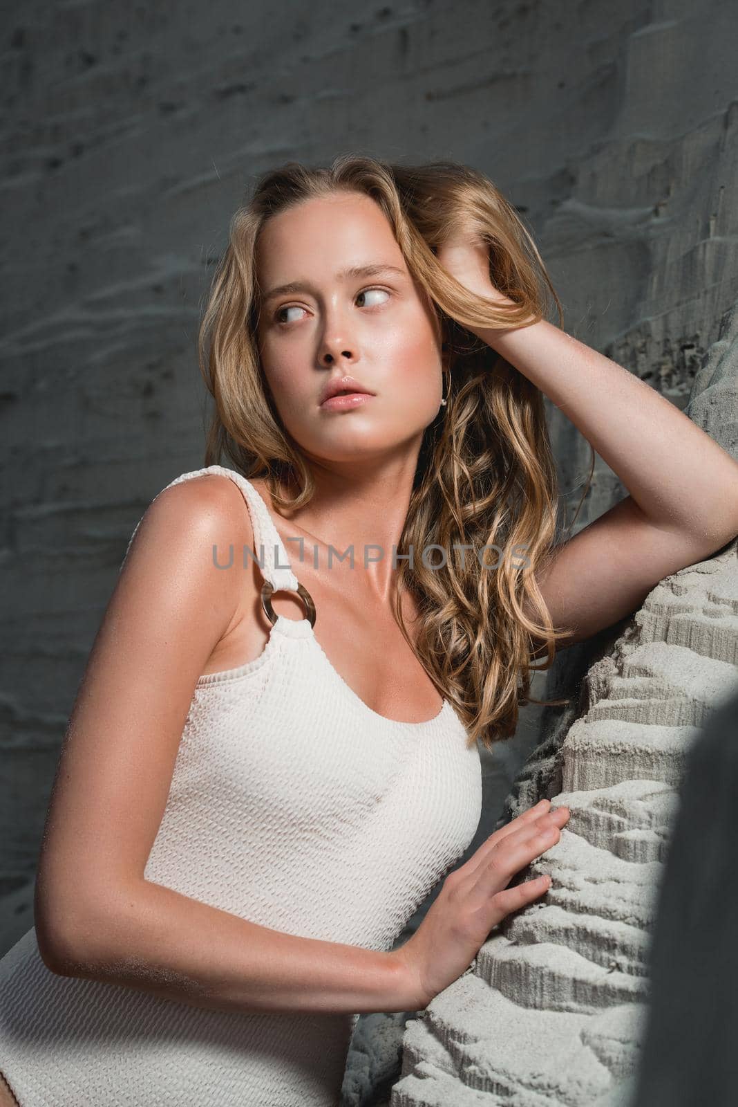 girl sitting at sandy beach. Outdoor portrait of pretty curly woman by Ashtray25