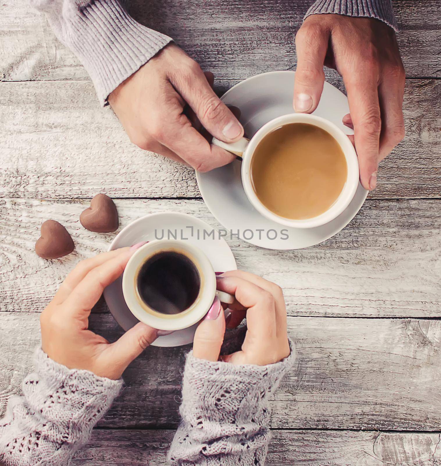 A cup of coffee. Selective focus. Couple. Drink.