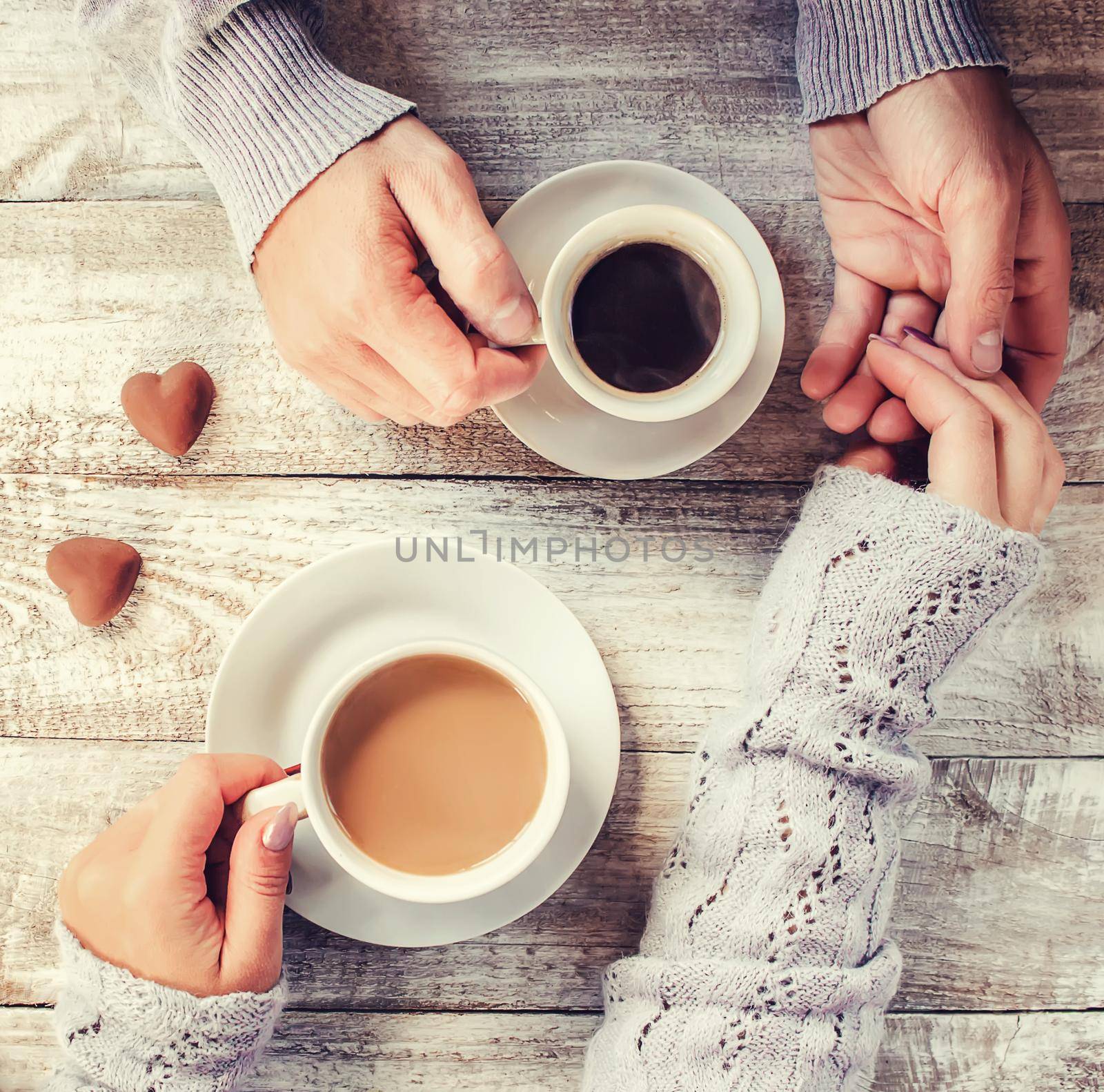 A cup of coffee. Selective focus. Couple. by yanadjana