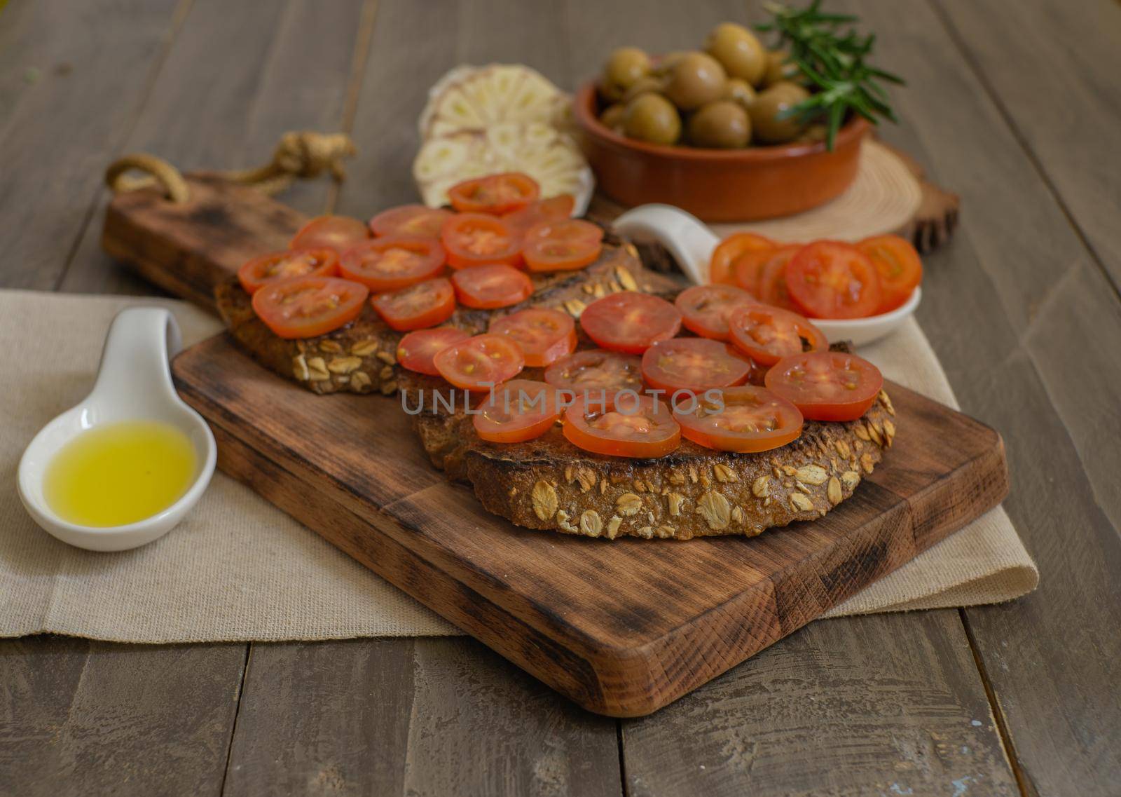bread toast with cherry tomato by joseantona