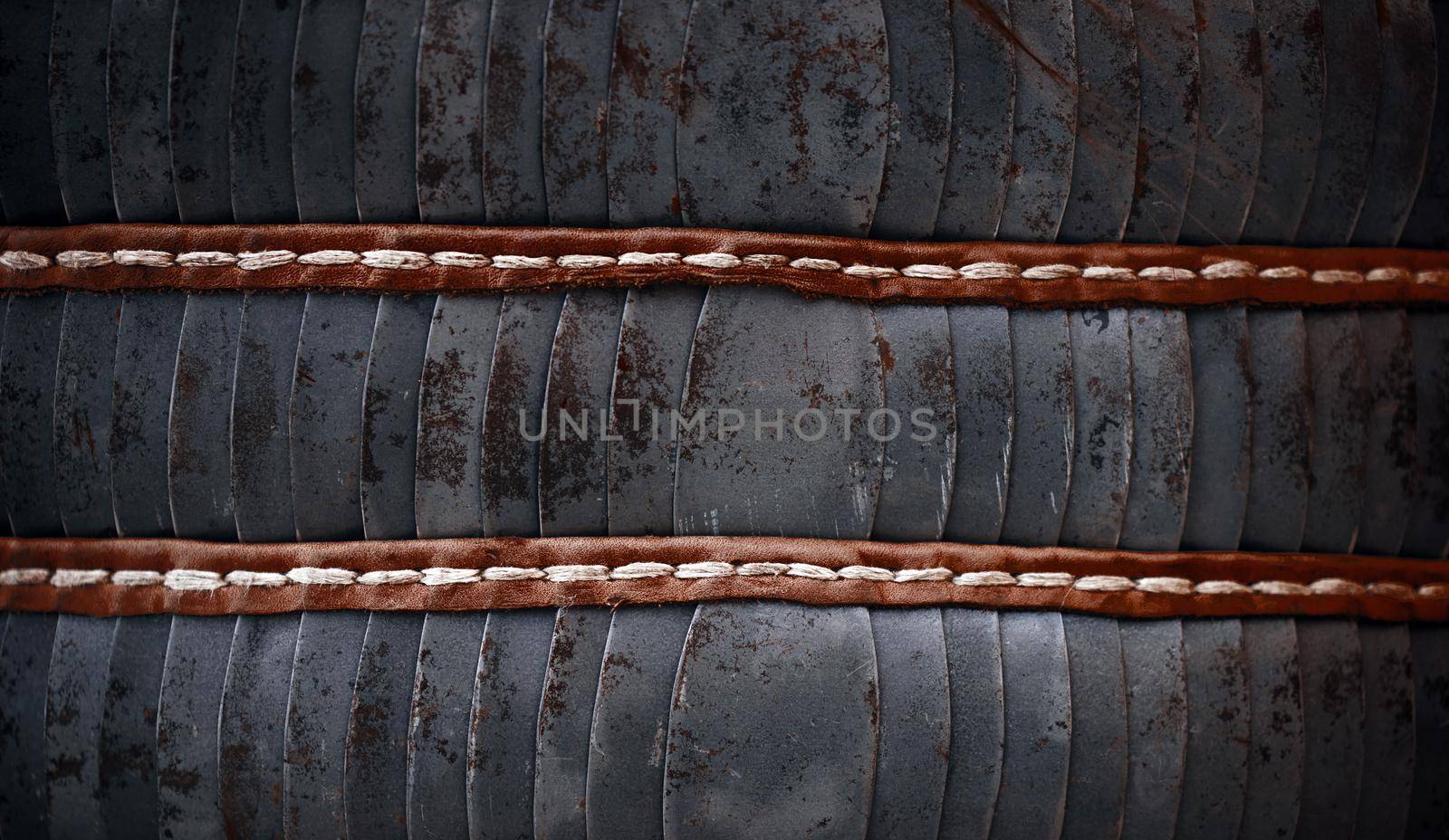 Scaly armor. Elements of plate armor of medieval warfare. metal plates, vintage scaly armor for body protection.