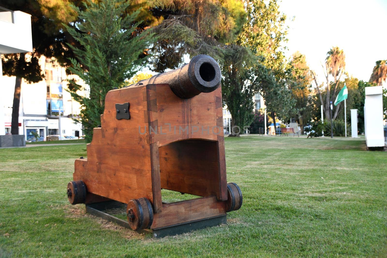 Old war cannon from a ship now resting in a garden