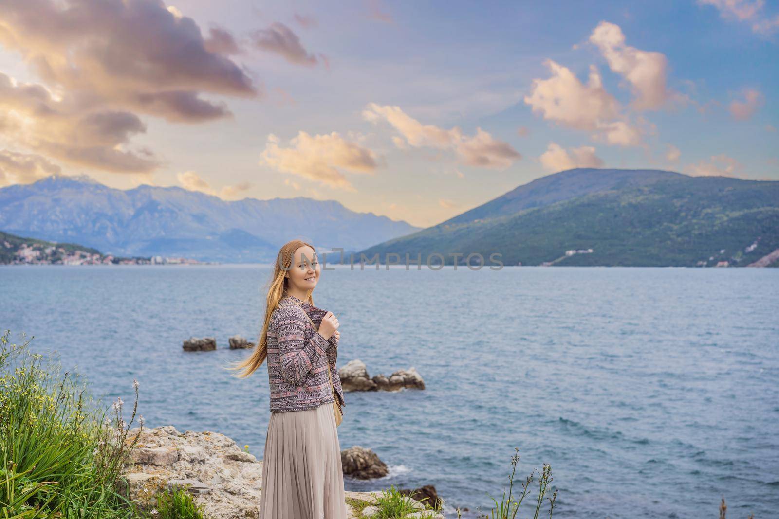 Woman tourist in Herceg Novi old town. Historical and touristic center of Herceg Novi. Montenegro.
