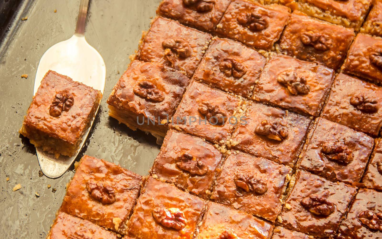 Baklava honey with walnuts. Selective focus. food.