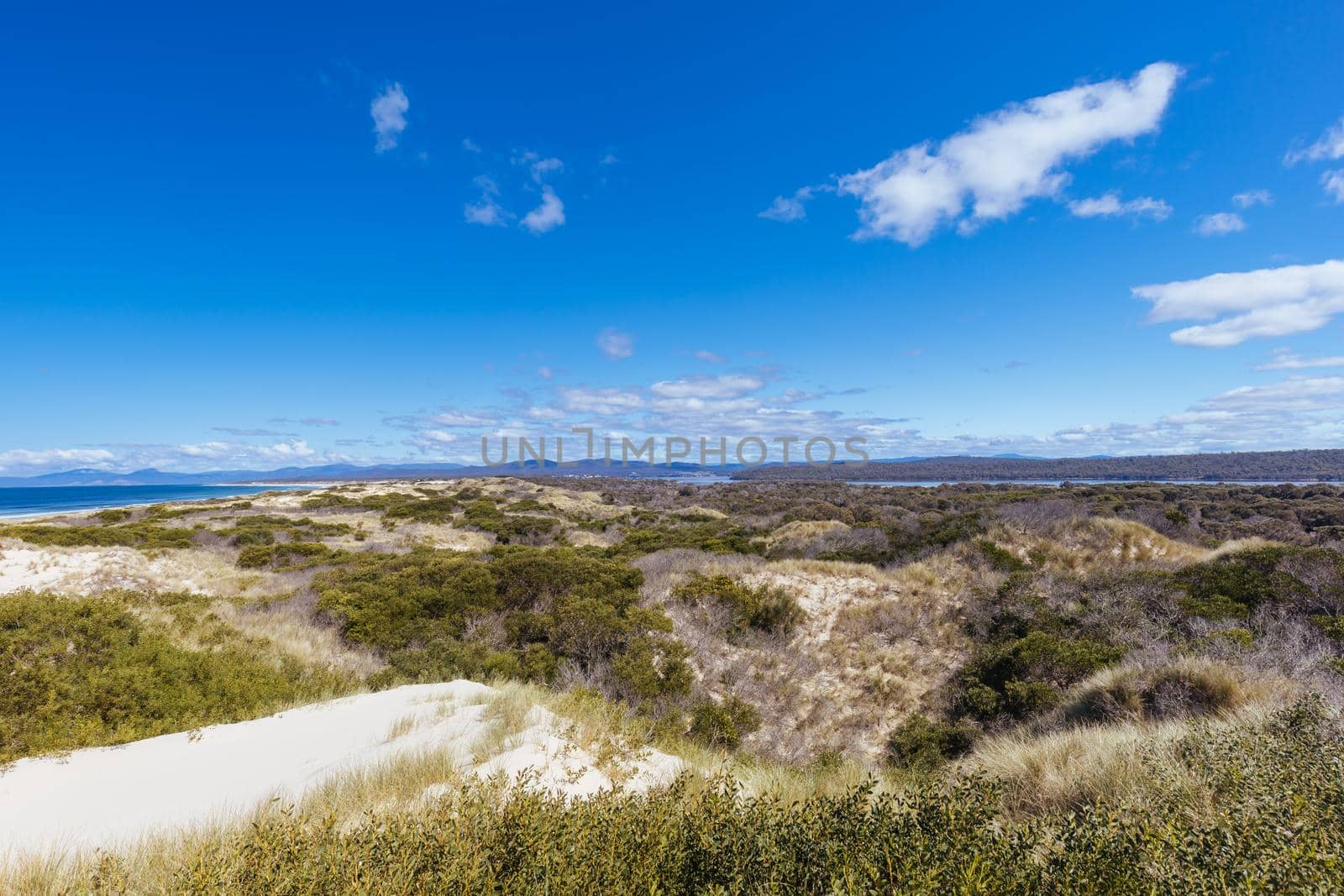 The popular Peron Dunes with 4WD driving in Akaroa, near St Helens in Tasmania, Australia