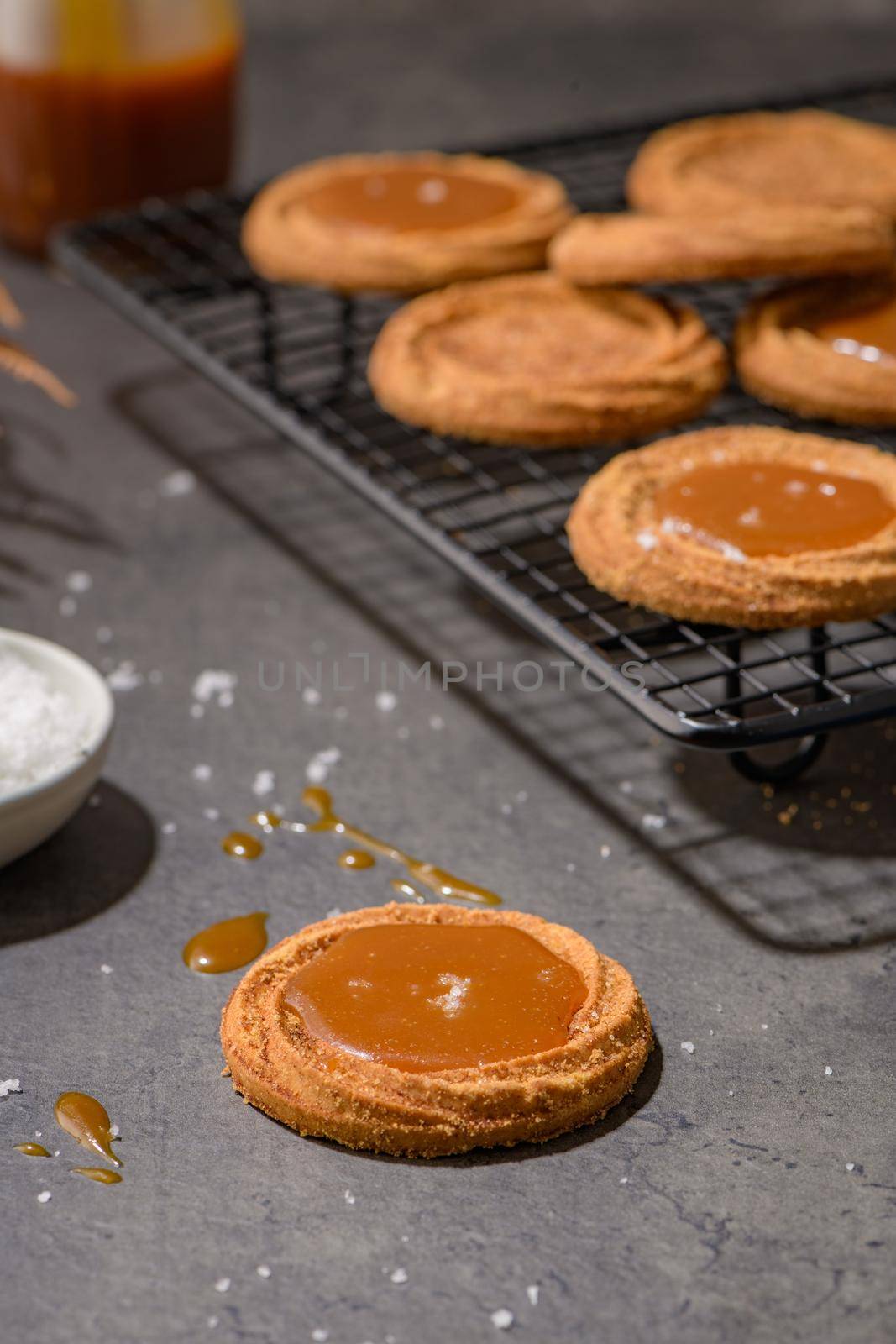 Caramel cookies flowing out of the oven, in the kitchen after baking.