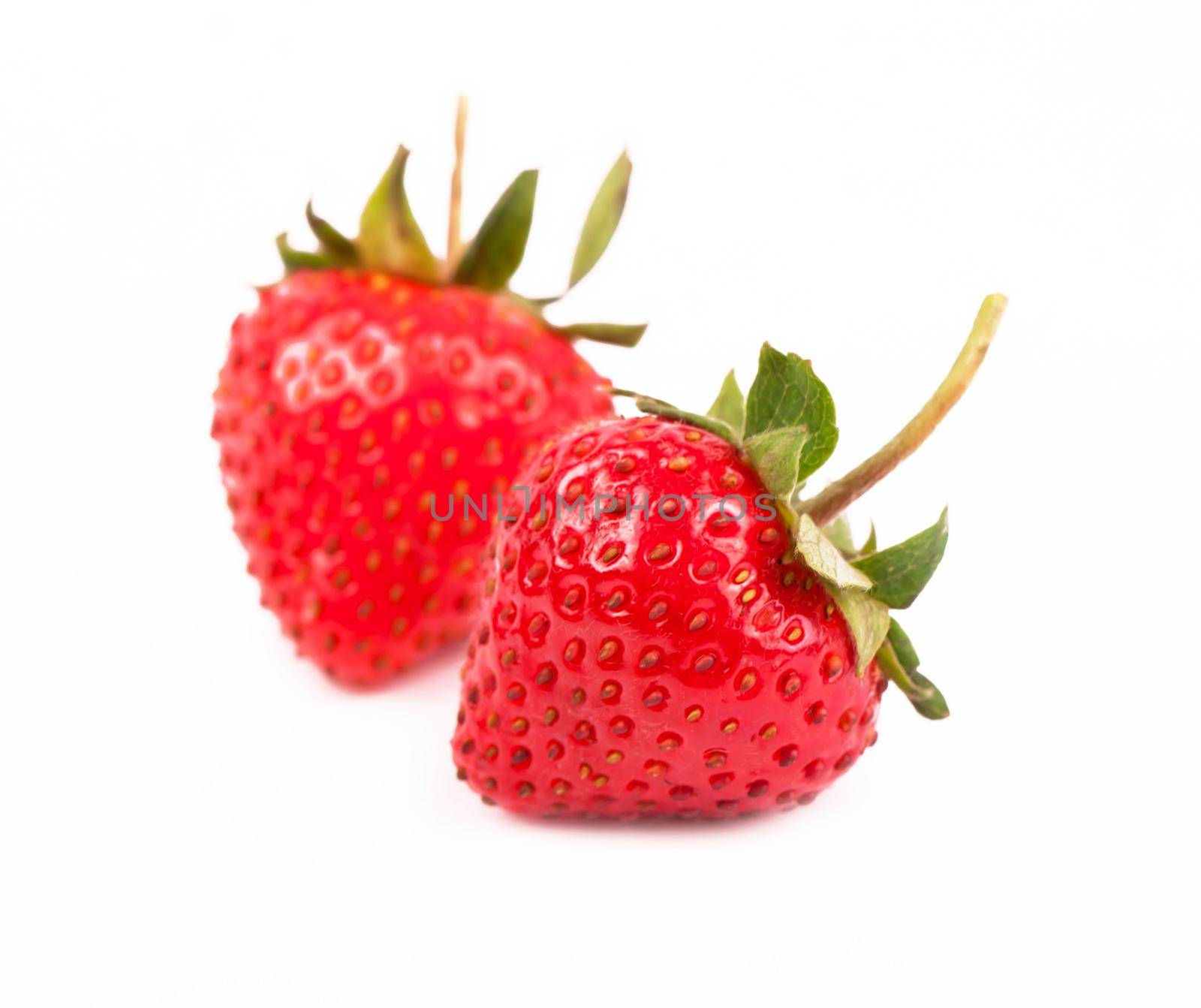 strawberry berry with green leaf isolated on white background