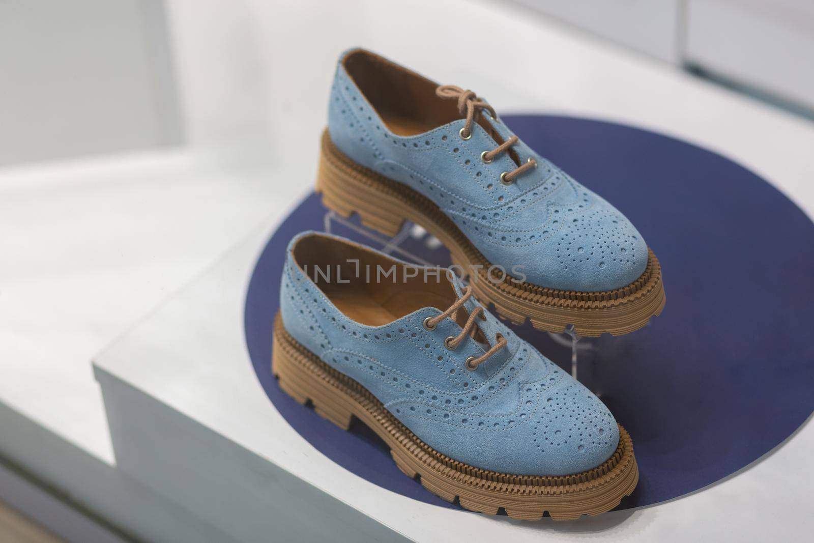 Light blue beautiful fashionable female loafers shoes. by BY-_-BY