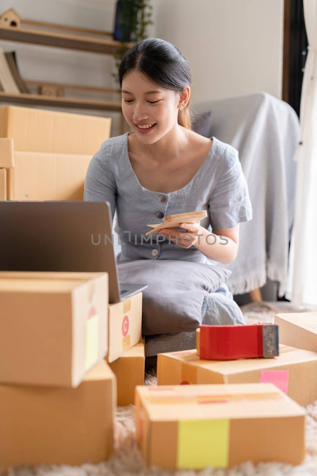 Asian small business owner working at home office. Business retail market and online sell marketing delivery, SME e-commerce concept.