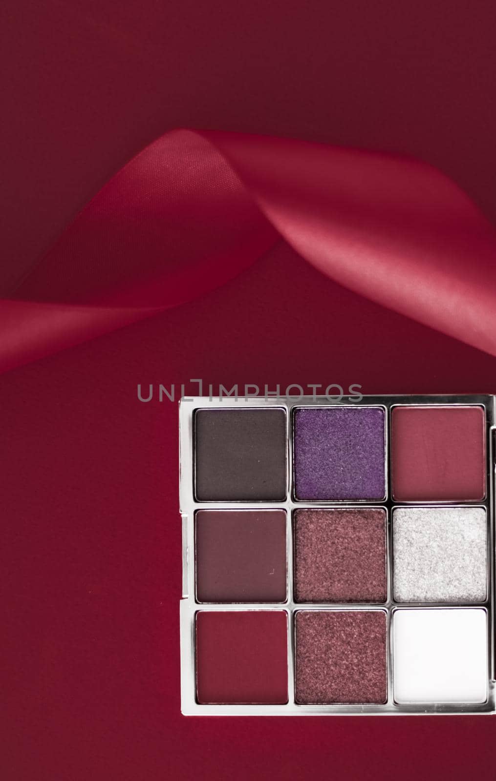 Cosmetic branding, mua and girly concept - Eyeshadow palette and make-up brush on cherry background, eye shadows cosmetics product for luxury beauty brand promotion and holiday fashion blog design