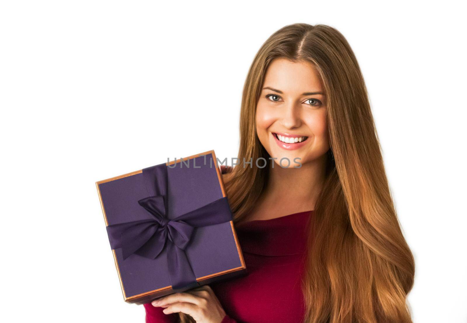 Birthday, Christmas or holiday present, happy woman holding a purple gift or luxury beauty box subscription delivery isolated on white background, portrait