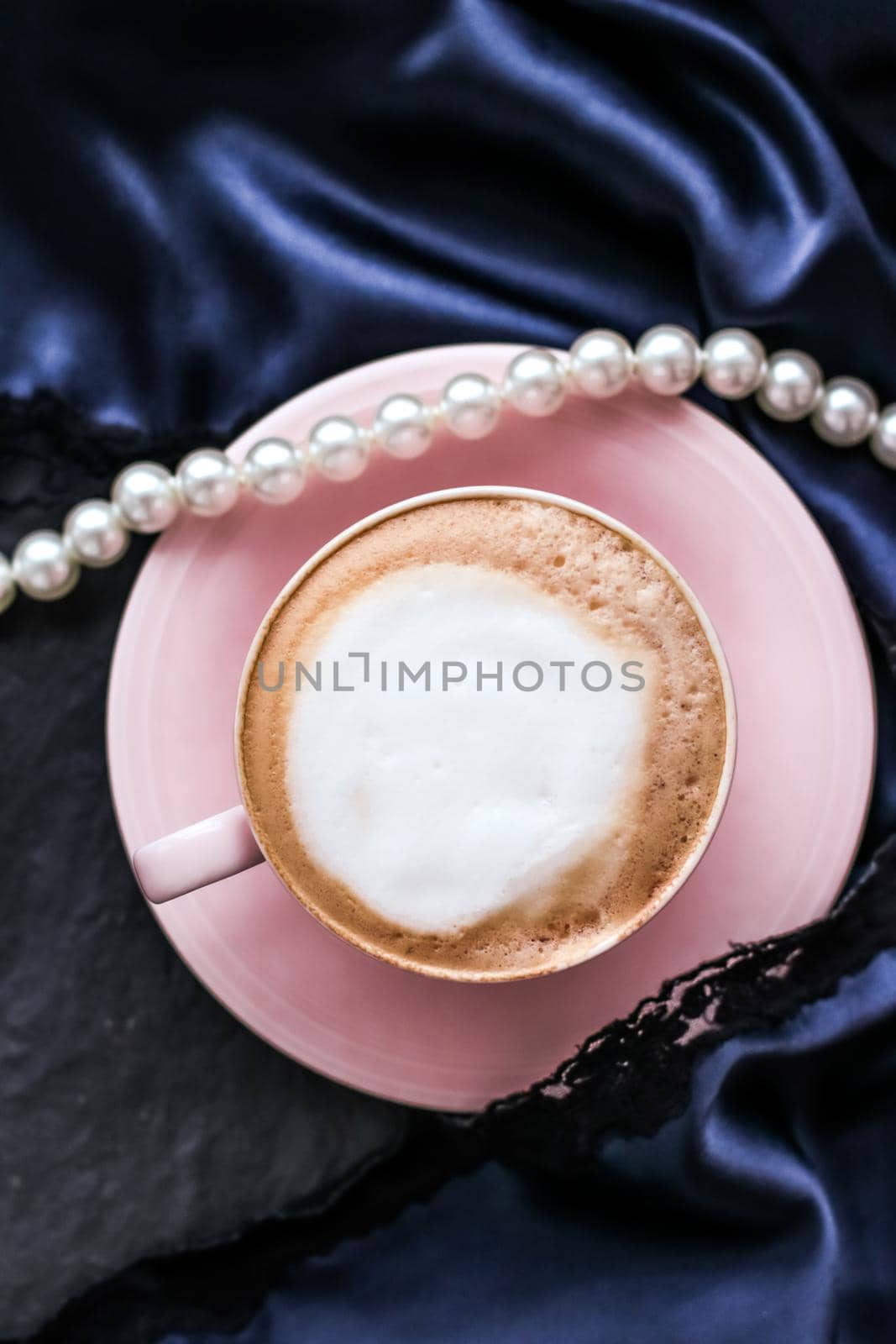 Menu, branding and recipe concept - Cup of cappuccino for breakfast with satin and pearls jewellery background, organic coffee with lactose free milk in parisian cafe for luxury vintage holiday brand