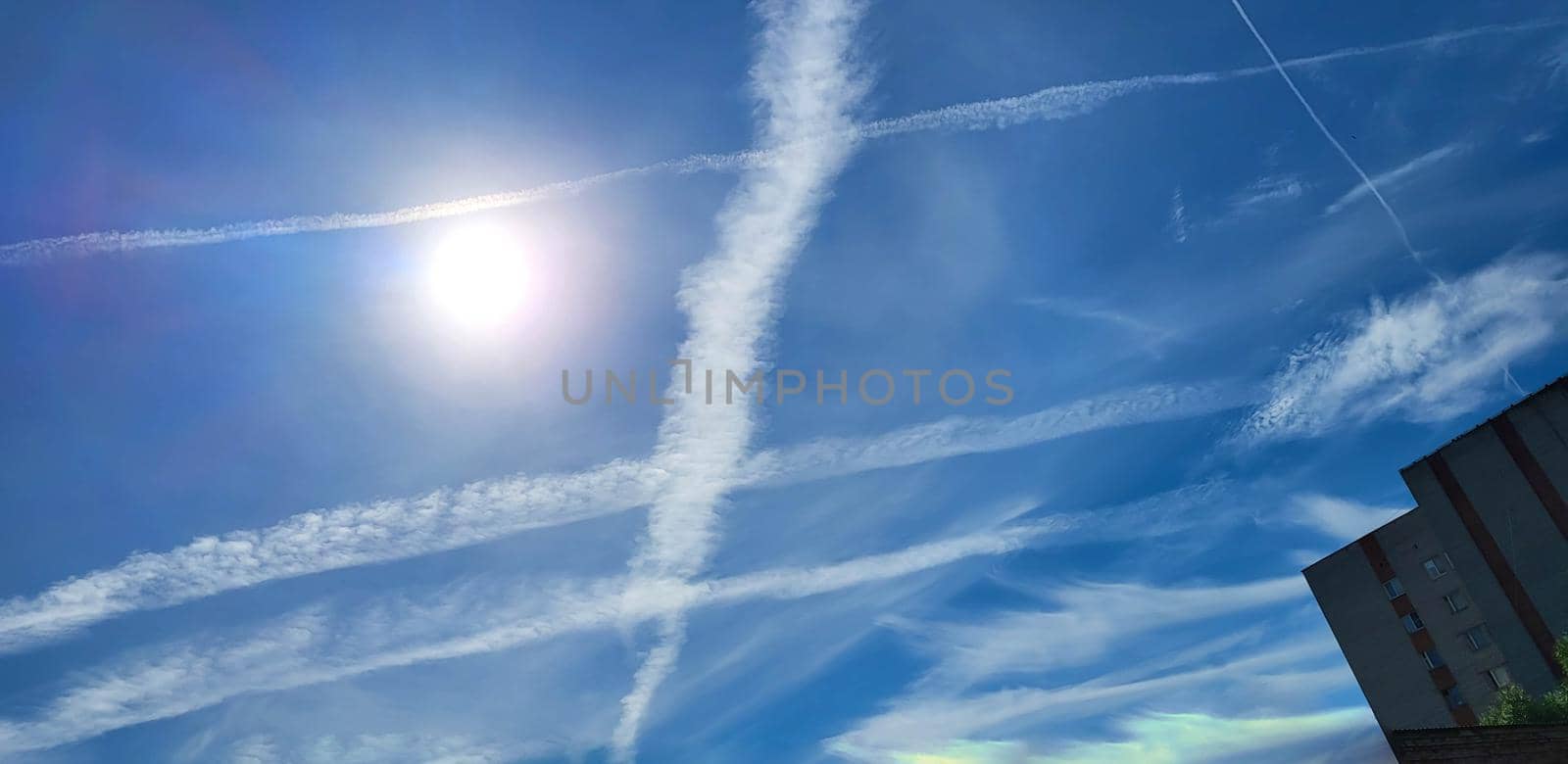 Blue sky with light white clouds on a sunny summer day