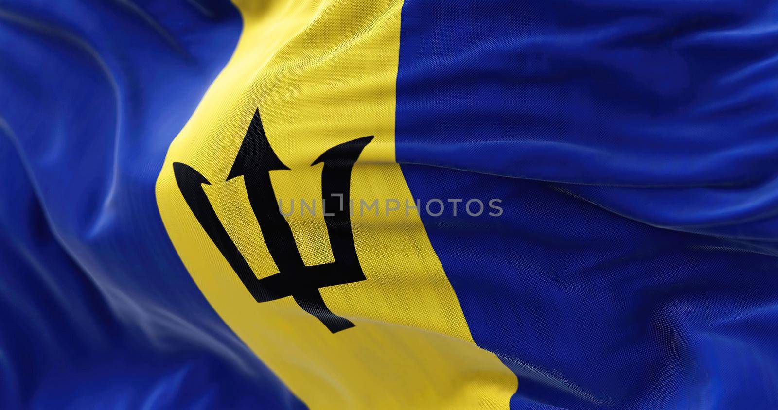 Close-up view of the Barbados national flag waving in the wind by rarrarorro