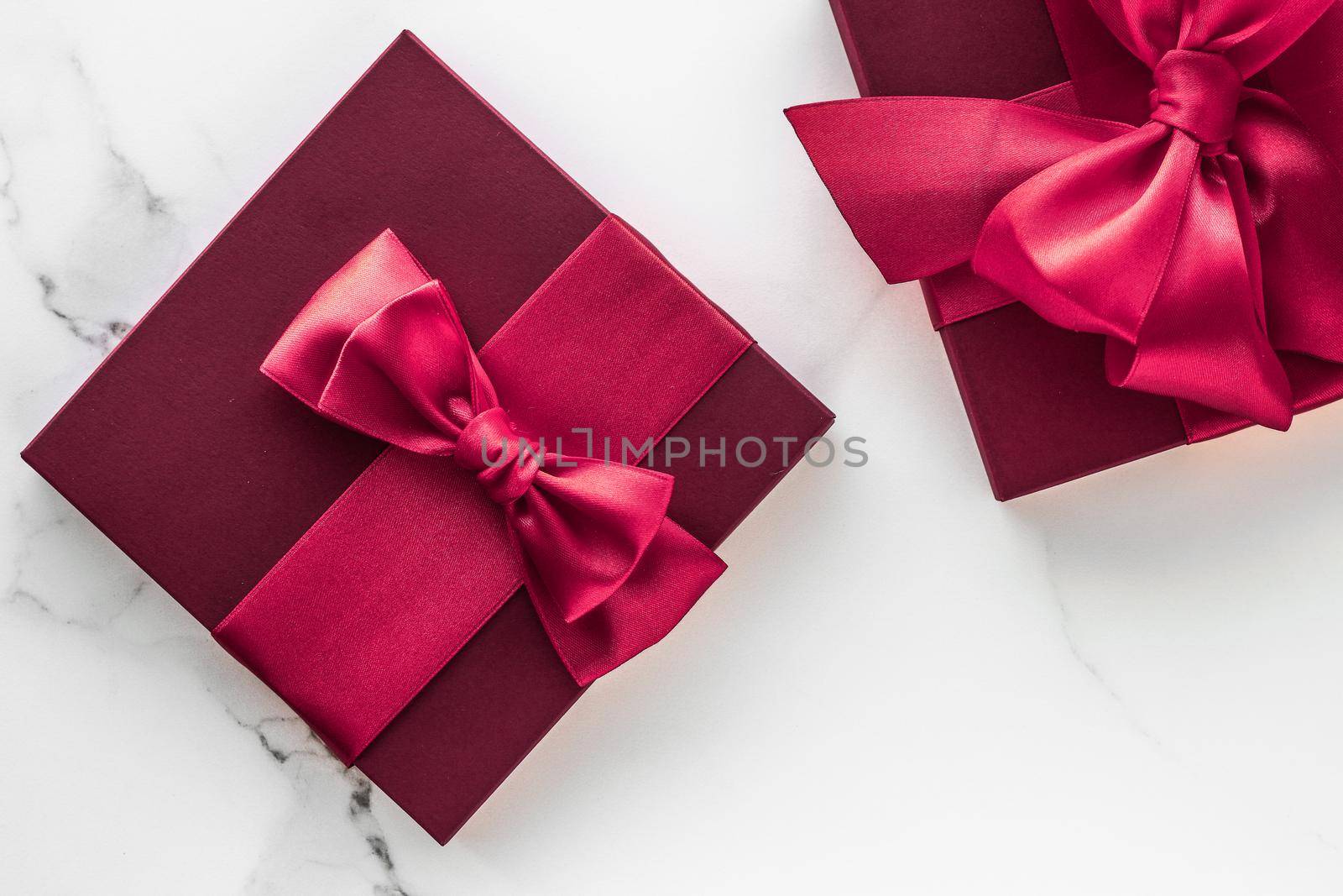 Wedding present, shop sale promotion and love celebration concept - Gift boxes on marble background, holiday flatlay