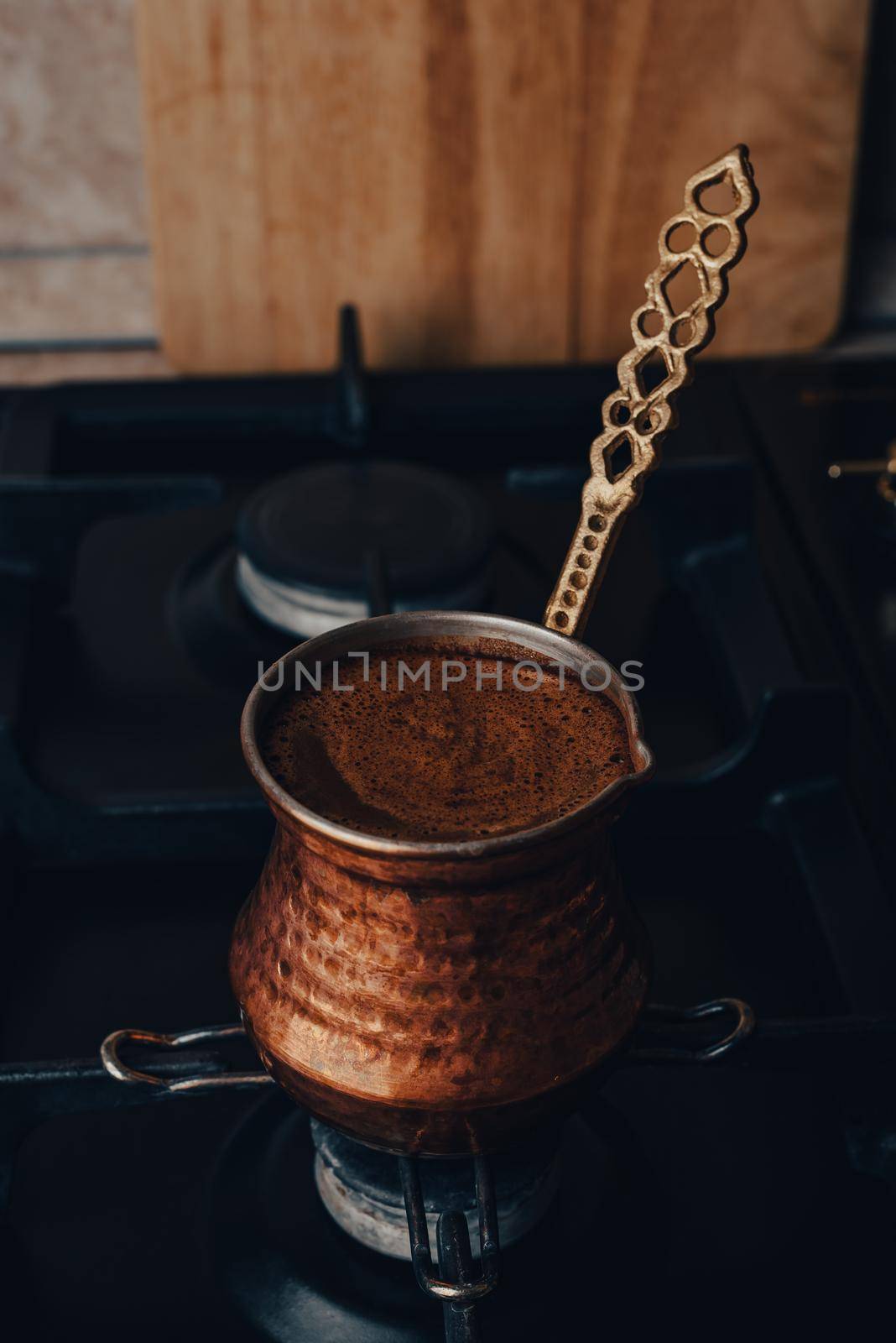 Coffee Boiling In Copper Cezve on Stove