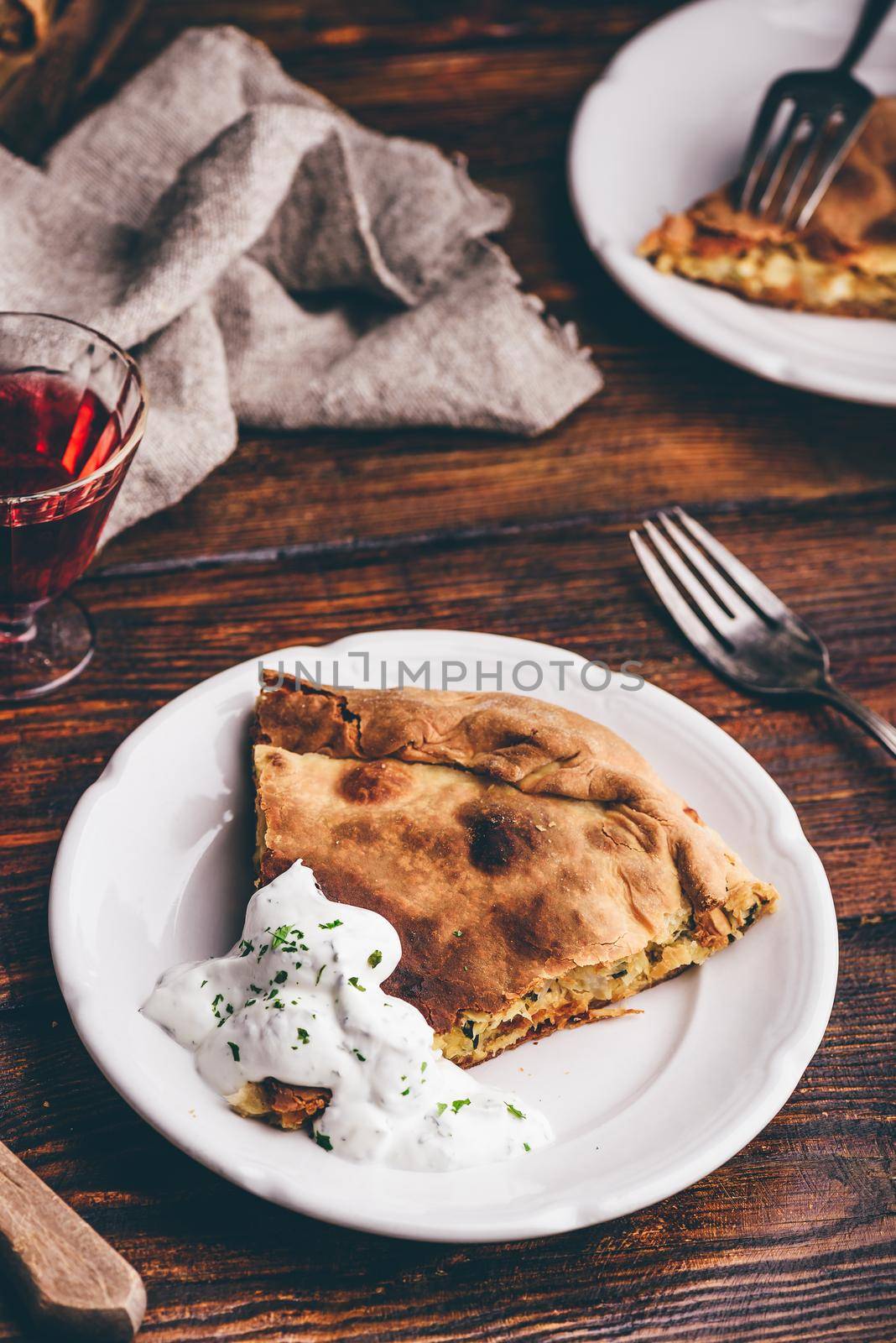 Slice of cabbage pie with sour cream sauce by Seva_blsv