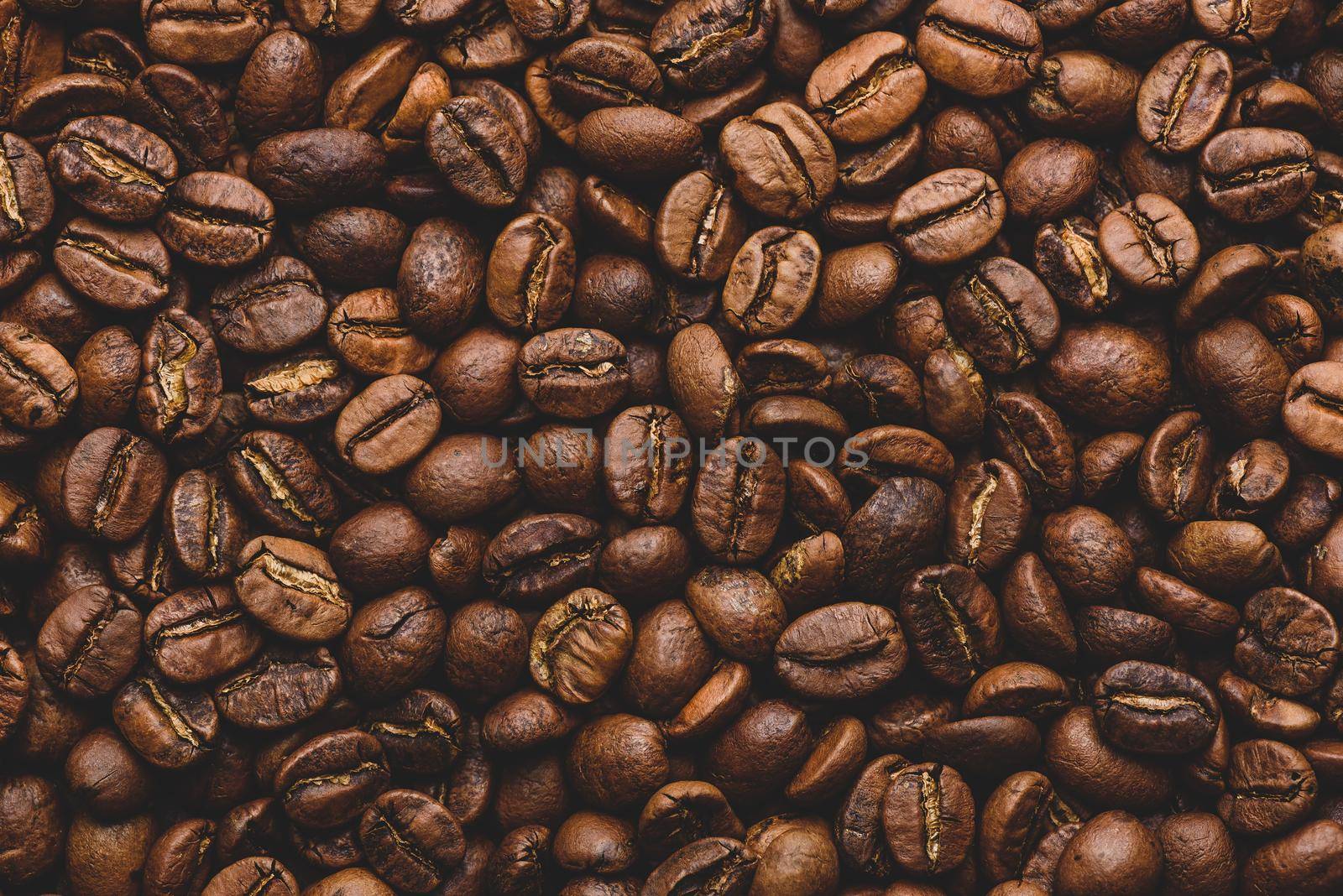 Background of fresh roasted coffee beans. View from above